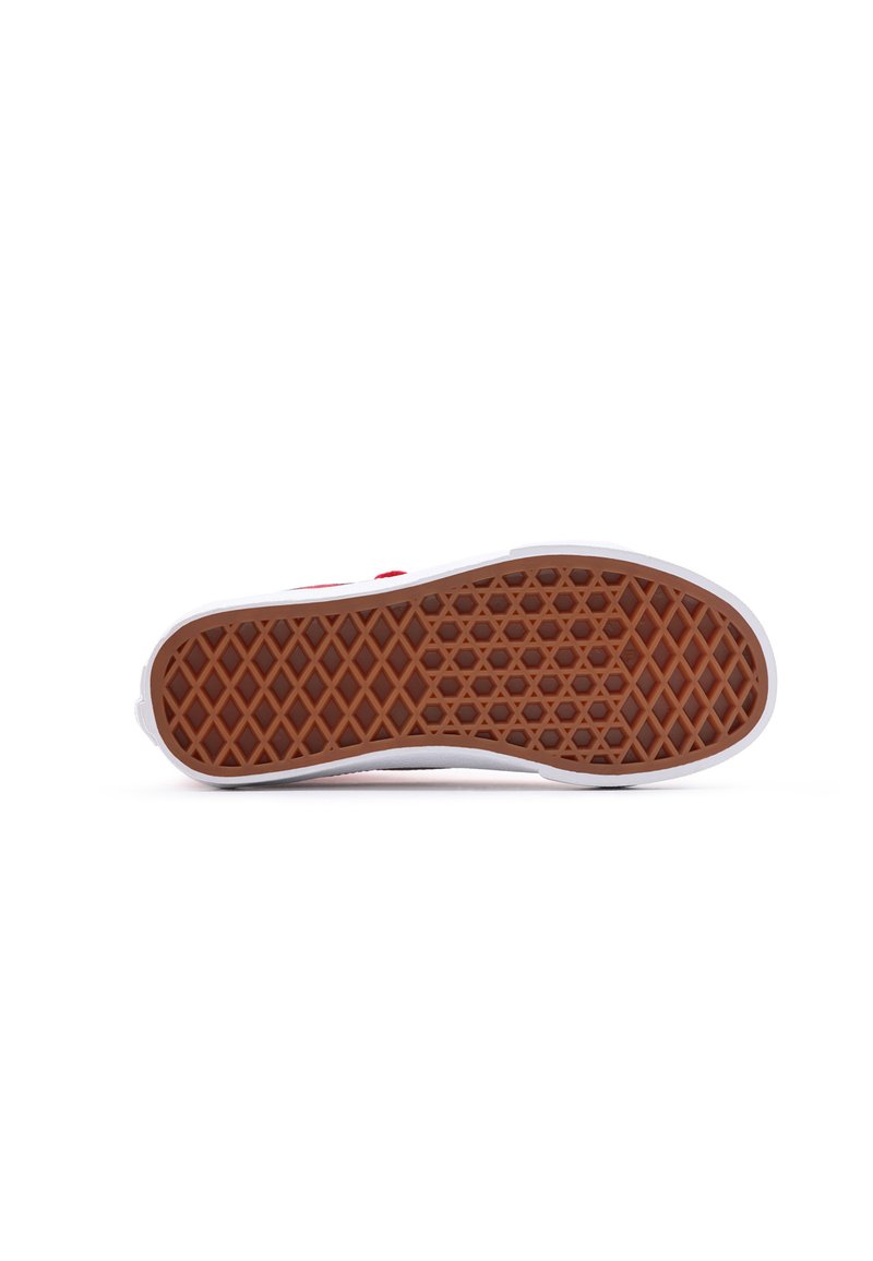 Semelle de chaussure en caoutchouc avec un motif texturé en gaufre marron, entourée d'un bord blanc. Le design est plat et léger.