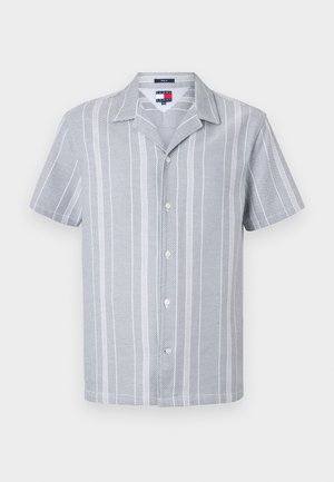 Short-sleeve button-up shirt in light blue with white vertical stripes; features a camp collar and textured fabric. Five buttons down the front.