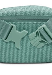 Green textured bag with a zipper closure and contrasting light green plastic hardware. Features adjustable strap and unique patterned fabric.