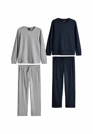 Two sets of long-sleeve sweatshirts and matching pants, one in light gray and one in dark navy blue, displayed on a white background.