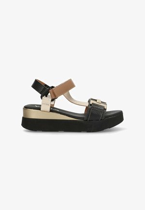 Sandalias de plataforma black and tan con un upper texturizado, tira ajustable y acentos beige contrastantes en una suela negra gruesa.