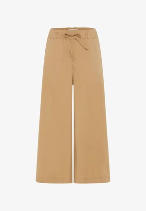 Beige wijde broek met elastische tailleband en verstelbaar trekkoord, ontworpen voor casual of ontspannen draagcomfort.