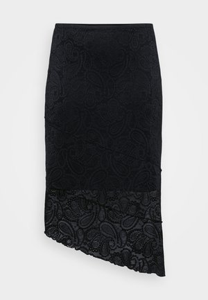 Svart skjørt med et teksturert paisley-mønster, asymmetrisk kant og blonderdekor nederst. Laget av et mykt, elastisk stoff.