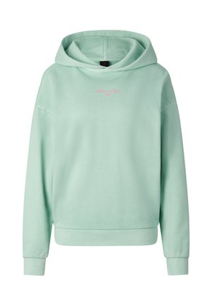 Miętowa bluza z kapturem z kieszenią z przodu i małym różowym napisem „Free and Free 1989” na środku piersi.