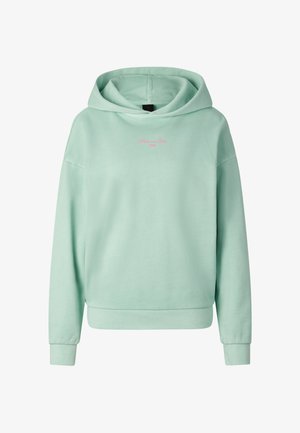 Hellgrüner Hoodie mit Frontkängurutasche und kleinem pinkfarbenem Schriftzug „Free and Free 1989“ mittig auf der Brust.