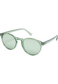 Occhiali da sole verdi trasparenti con lenti rotonde, montatura in plastica leggera e aste slanciate. Nessun motivo o accento visibile.