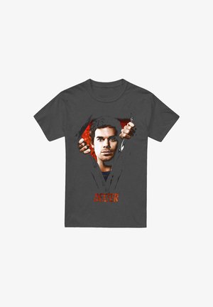 Dark gray cotton t-shirt featuring a graphic print of a man with a serious expression, surrounded by tearing effects and the word "DEXTER" below.