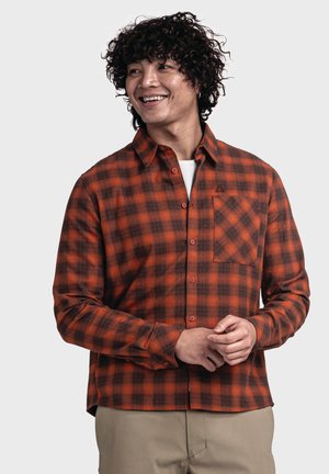 Men's button-up shirt featuring an orange and brown plaid pattern, made of soft fabric with a front pocket and a casual fit.