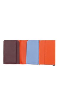 Leather wallet with four slots; features dark brown, vibrant orange, soft blue, and bright orange sections; smooth texture with clean lines.