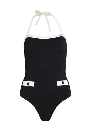 Must must-kleid, mille tekstuuri kangaga, valgete aktsentidega dekolteel ja küljel ning paeltega rihmadega seljaosas.