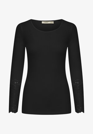 Melna garām piedurknēm kreklā ar noapaļotu apkakli, kas rotāta ar mežģīņu akcentiem pie piedurknēm. Izgatavots no gludas auduma, piedāvā pieguļošu dizainu.