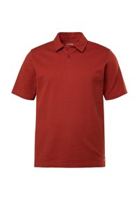 Röd kortärmad polo med ett texturerat mönster, knappslå och platt krage. Har en liten logotyp vid fållen.