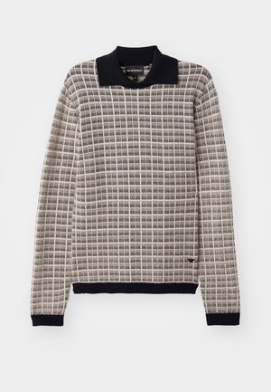 Pullover en tricot beige avec un motif à carreaux et un col marine. Il dispose de manches longues et de poignets marins, mettant en valeur un tissu texturé.