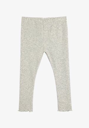Grå ribbede leggings med en tætsiddende form, der har en lille baglomme og en flæset kant ved anklerne. Blød stofstruktur hele vejen igennem.