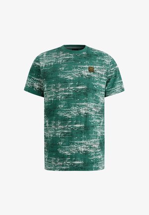 Zielona koszulka z krótkim rękawem z grafiką przedstawiającą abstrakcyjny wzór z białymi i czarnymi akcentami. Okrągły dekolt i krótkie rękawy. Zawiera małą metkę marki.