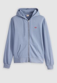 Felpa con zip di colore blu chiaro, realizzata in misto cotone, con tasca frontale, cappuccio regolabile e logo rosso di Levi's sul petto.