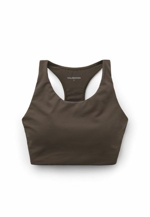 Brązowy stanik sportowy wykonany z gładkiego materiału z plecami w stylu racerback. Posiada minimalne szwy oraz metkę wydrukowaną wewnątrz. Rozmiar S.