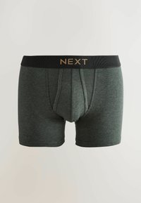 Boxer briefs da uomo in grigio scuro con una vita nera che presenta il nome del marchio "NEXT" in lettere beige, mostrati su uno sfondo semplice.