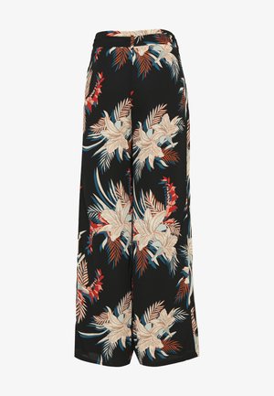 Pantalon noir à jambes larges et taille haute, orné d'un imprimé floral tropical aux teintes beige, rouge, bleu et marron.