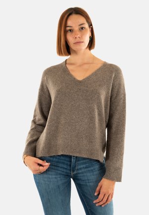Maglione marrone in morbido punto maglia con scollatura a V e maniche lunghe, caratterizzato da una vestibilità rilassata e orlo a coste sul fondo e sui polsini.