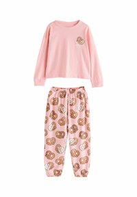 Pink long-sleeve top with a pretzel graphic and the text "BREAKFAST & CHILL" paired with pink pants featuring a pretzel pattern.