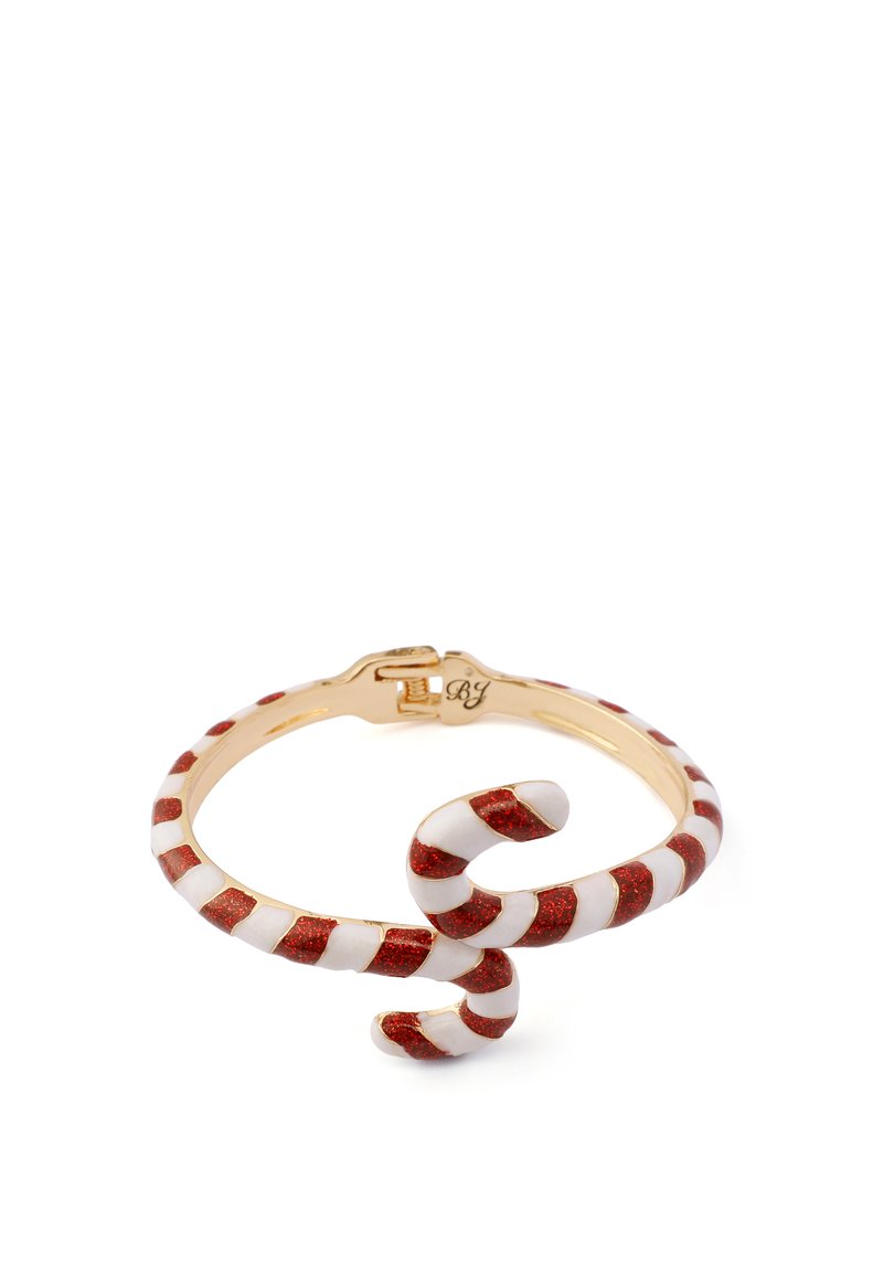 Guldtonad armband med en godiskäppdesign, med röda glittrande ränder och vita accenter, format i en vriden form med ett lås.