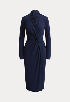 Μπλε μίντι φόρεμα με μακριά μανίκια, με draped λεπτομέρεια τύπου wrap στη μέση και ψηλό λαιμόκοψη με φερμουάρ στο πίσω μέρος.