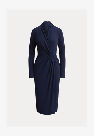 Μπλε μίντι φόρεμα με μακριά μανίκια, με draped λεπτομέρεια τύπου wrap στη μέση και ψηλό λαιμόκοψη με φερμουάρ στο πίσω μέρος.