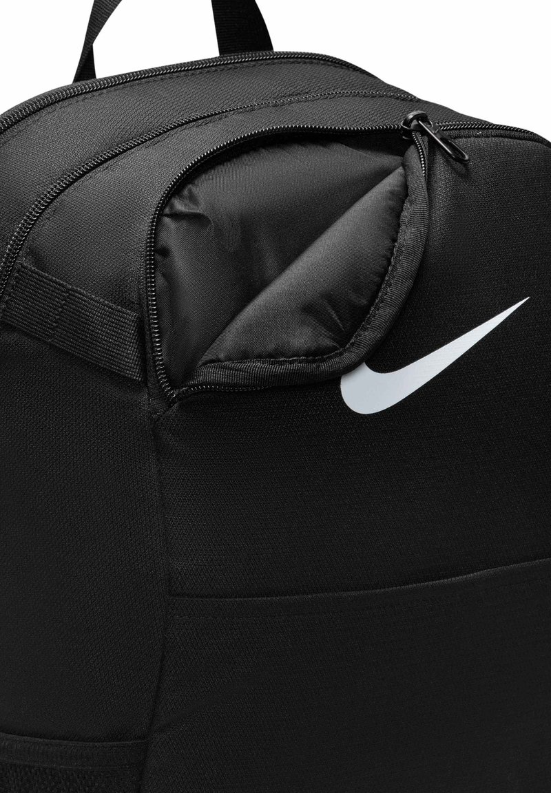 jansport backpack front pouch has holes Mini Break womens-backpack Color:Pearl Splatter Back pleated front stash pocket Nike Men's Brasilia Extra-Large