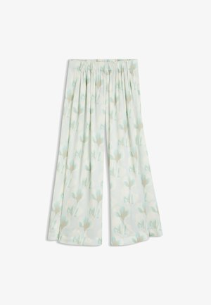 Pantalon à jambes larges et taille haute avec une ceinture élastique douce, présentant un motif floral pastel clair sur fond blanc.