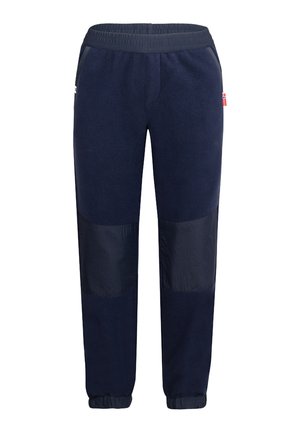 Navy blue fleece pants with elastic waist and cuffs, reinforced knee patches, and side pockets with small flag tags.