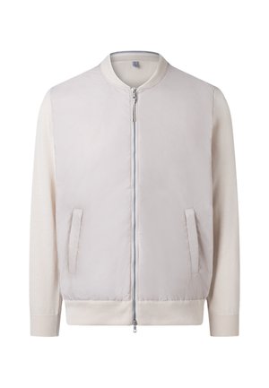 Chaqueta bomber color beige claro con cuello, puños y borde inferior acanalados, cremallera frontal y dos bolsillos verticales a los lados.