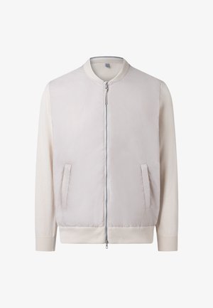 Lysebeige bomberjakke med ribbet krave, manchetter, kant, lynlås foran og to vertikale sidelommer.