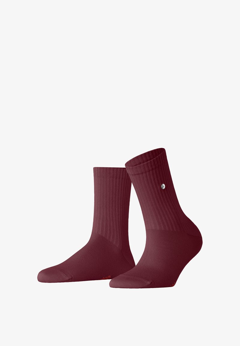 Burgunderrote Socken mit geripptem Design, Knöchellänge, verstärkter Zehenpartie und einem kleinen Logoakzent an der Seite. Weiche Mischung für zusätzlichen Komfort.