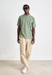 BOSS DYE - Polo majica - open green