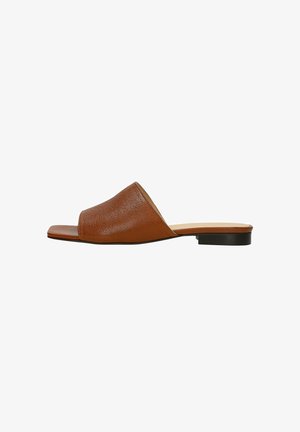 Brown leather slide sandal with a textured upper, a wide open toe, and a low black heel. Simple, minimalist design with smooth edges.