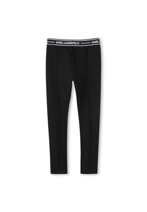 Leggings noirs en tissu extensible, dotés d'une large taille blanche avec la marque "KARL LAGERFELD" et un design lisse et ajusté.