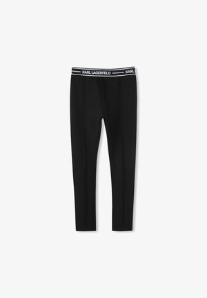 Zwarte leggings van rekbaar materiaal, met een brede witte waistband voorzien van de "KARL LAGERFELD" branding en een soepel, op maat gemaakt ontwerp.