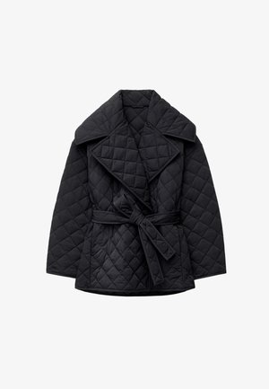Quilted black coat with wide collar, long sleeves, and a removable belt. Features a textured diamond pattern throughout the fabric.