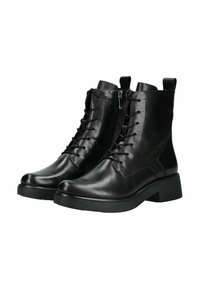 Un par de botas de cuero negro de media caña con cordones, cremallera lateral y suelas de goma gruesa, mostradas contra un fondo blanco.