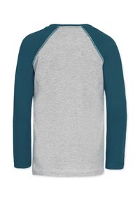 Langærmet skjorte med grå krop og teal farvede raglanærmer. Blødt bomuldsmateriale, kontrastsyninger og rund halsudskæring.