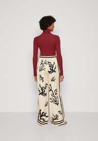 Malina BELLA PALAZZO PANTS - Hlače - white