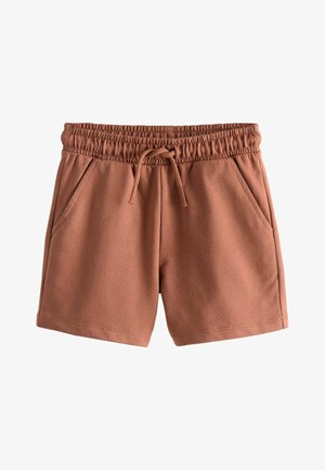 Brune shorts med elastisk talje, snøre og sidelommer, lavet af blødt stof, lagt fladt på en hvid baggrund.