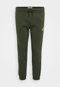 Olivgrüne Sweatpants aus einem weichen Baumwollmix, mit einem elastischen Taillenbund und Kordelzug sowie gerippten Bündchen an den Knöcheln.