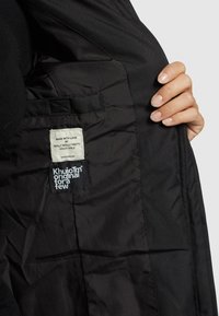 khujo Vinterkappa /-rock - black