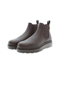 Botas de tobillo de cuero marrón con paneles laterales elásticos, punta redondeada y suelas de goma texturizadas. Cuenta con tiradores para facilitar su puesta.
