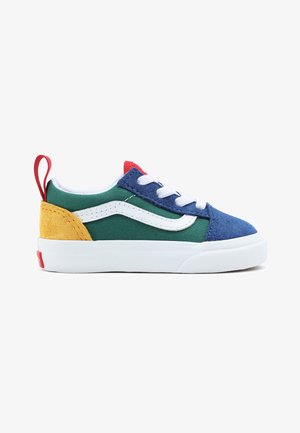 Colorful sneaker featuring green, blue, and yellow panels. Made of canvas and suede with a white rubber sole and lace-up design. Red accents.