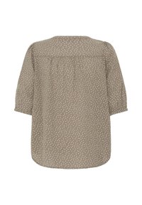 Blouse taupe à pois blancs, manches ballons aux coudes, empiècement froncé au dos et ourlet arrondi.