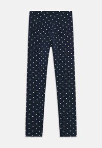 Tengerészett kék leggings, tejszínes pöttyös mintával. Rugalmas anyagból készült, testhezálló fazon, teljes hosszal, díszítések nélkül.