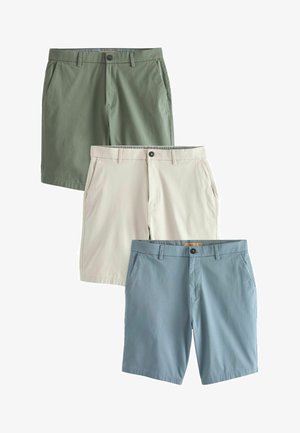 Három pár nadrág: olívazöld, bézs és világoskék, sima anyagból készült, oldalzsebekkel és kontrasztos derékpánt részletekkel.